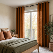 Terracotta Heavy Weight Linen Eyelet Curtains for Sliding Door in a Cozy Bedroom with Cream Walls, Black Rod, and Sage Green Bedding
@Heading: Eyelets