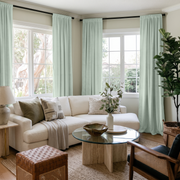 Mint Green Velvet Rod Pocket Curtains in a Contemporary Living Room with a White Sectional Sofa and Cane Accent Chair