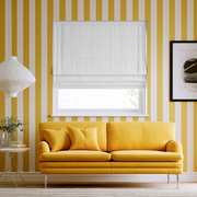 White Linen Cordless Roman Blinds in a Modern Living Room with Yellow Vertical Striped Wallpaper and a Bright Yellow Sofa