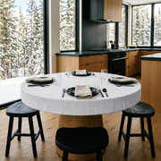 White Linen Fitted Round Tablecloth in a Modern Kitchen Dining Space with Black Countertops and Light Wood