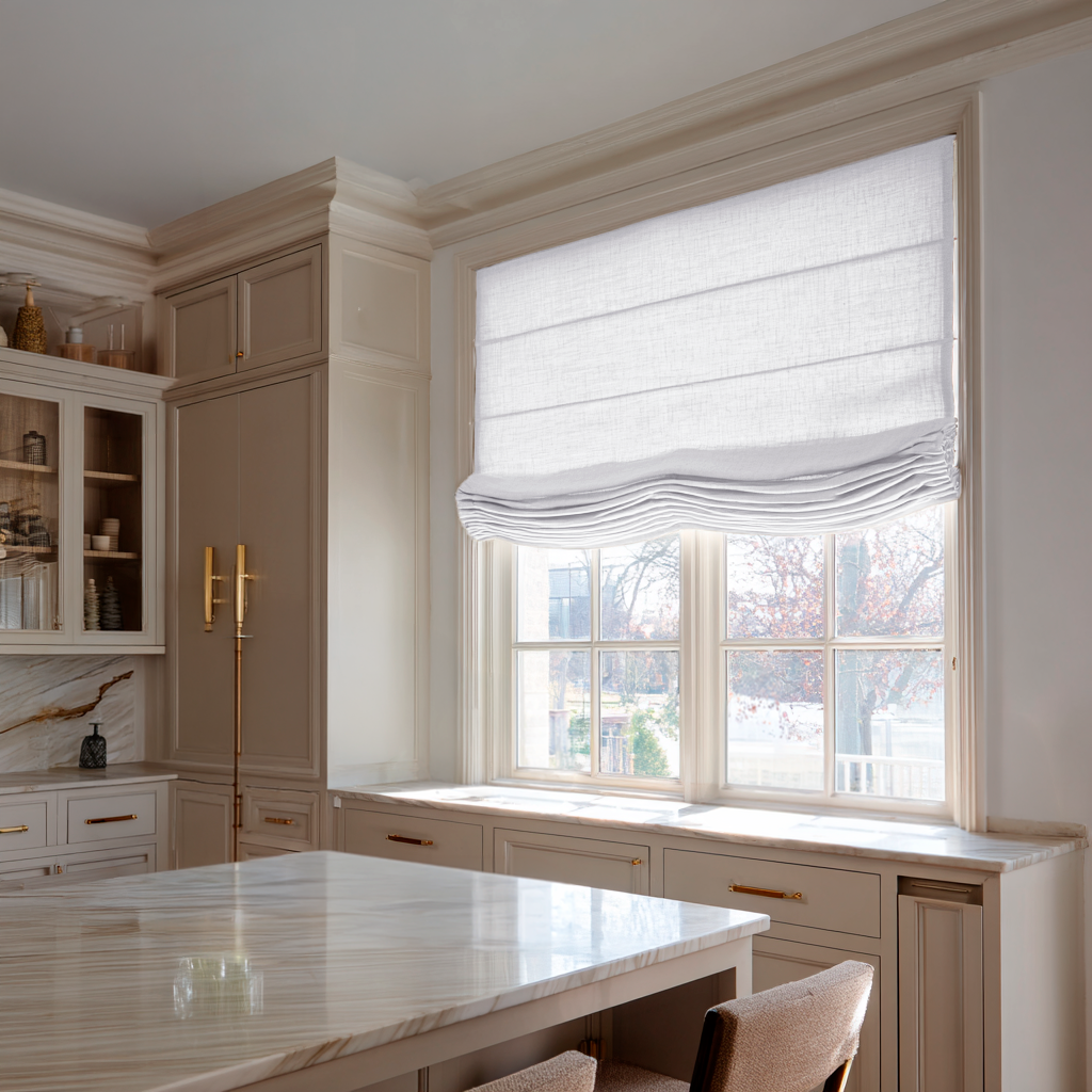 White Linen Kitchen Relaxed Roman Blinds in an Elegant Kitchen with Cream Cabinetry and Marble Countertops - Cotton Lining